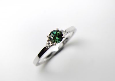 Teal_sapphire_3-stone_ring